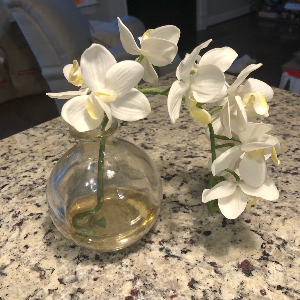 Faux orchid in vase